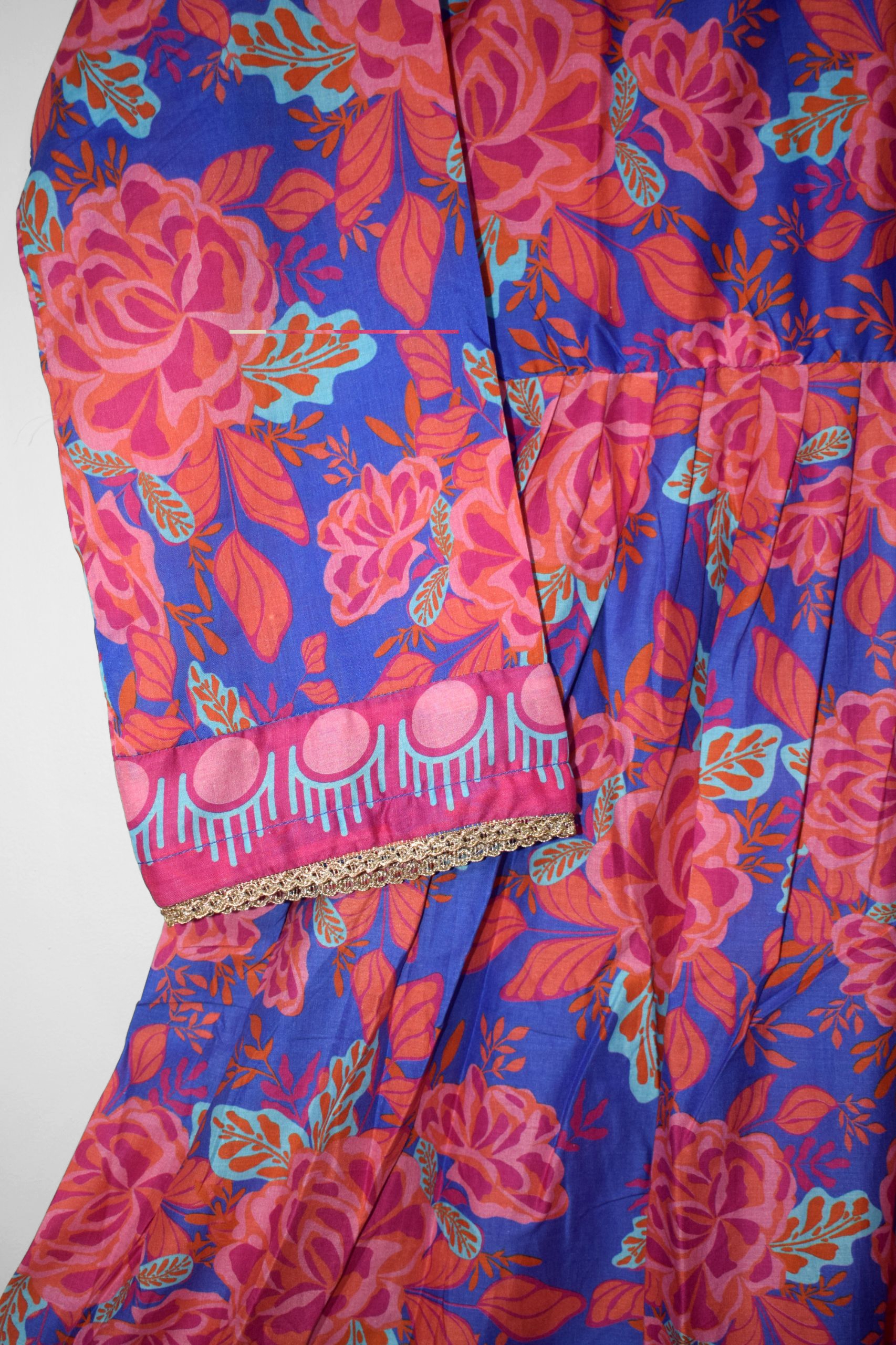 Royal Bloom lawn frock fabric close-up – premium floral digital print with lace sleeve border.