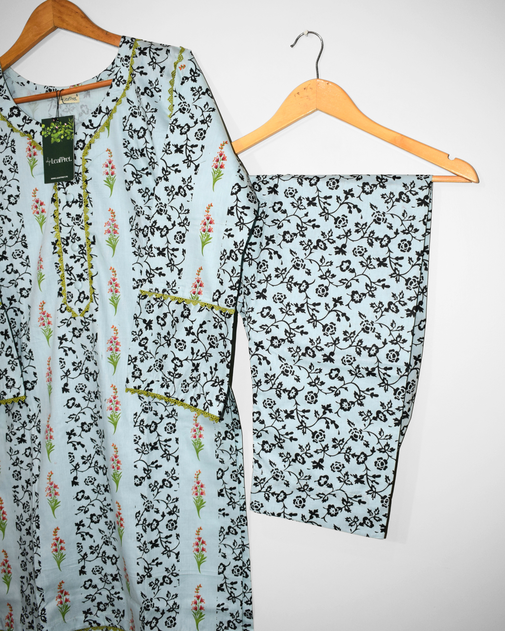 Bloomline 2-piece stitched cotton suit with black floral screen prints and lace detailing by LeafPret