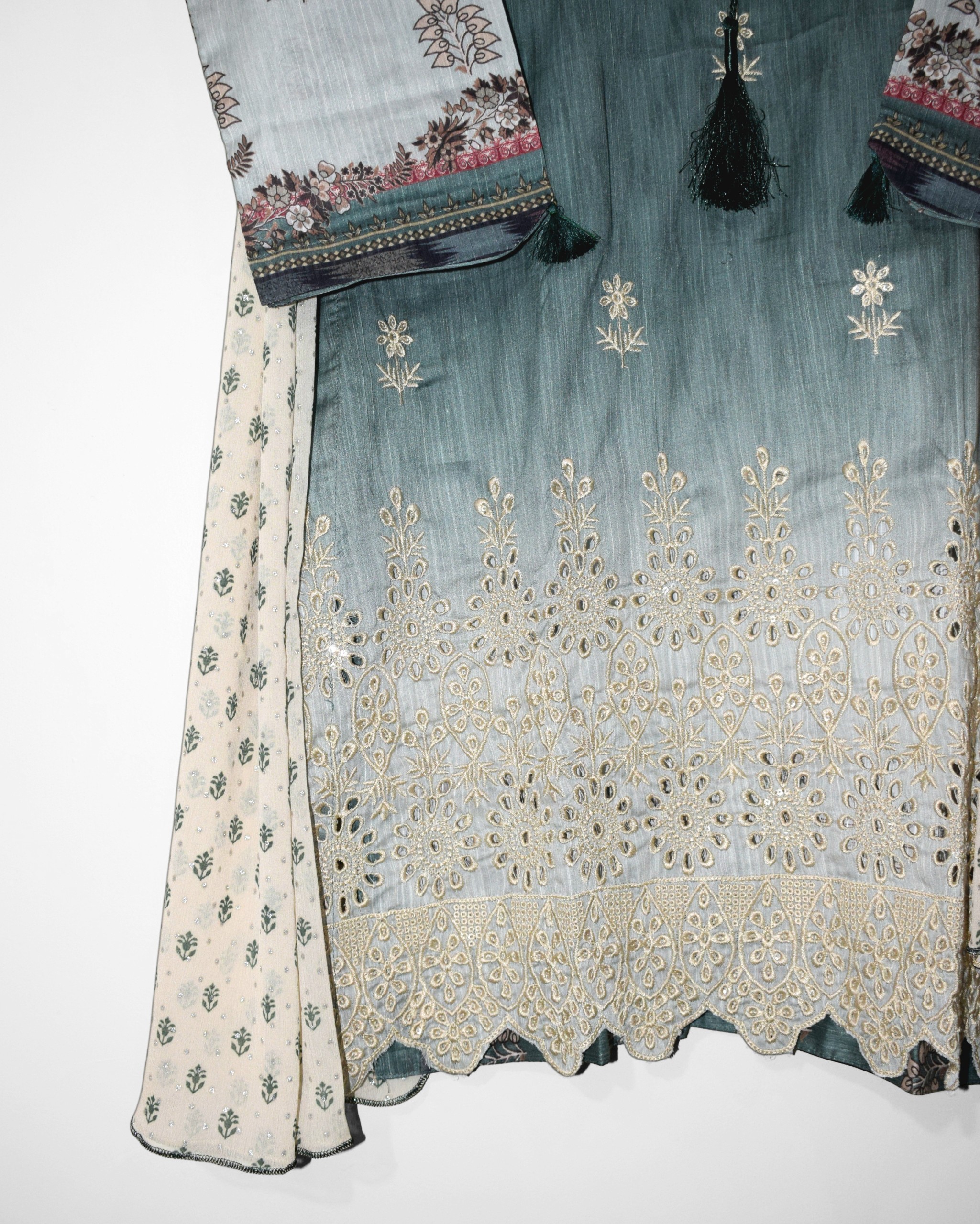 Mehr Noor heavily embroidered cutwork daman detail