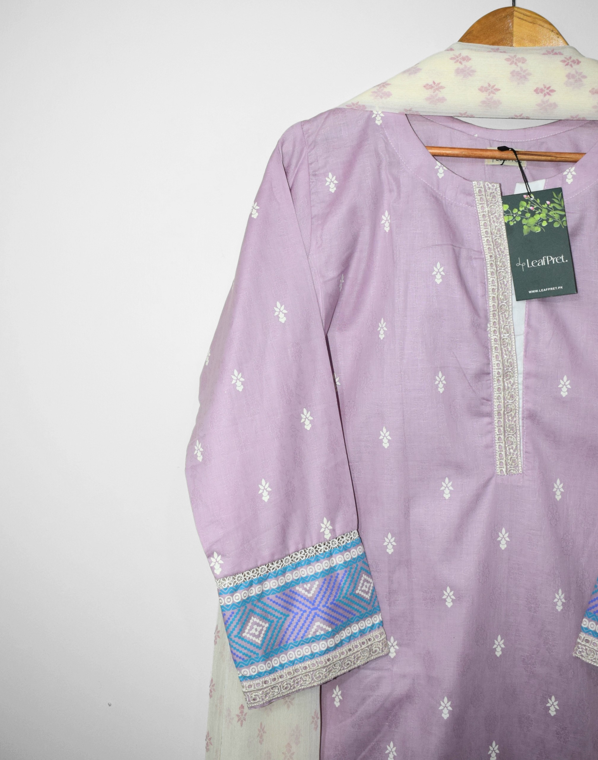 Lilac jacquard embroidered shirt closeup neckline daman details