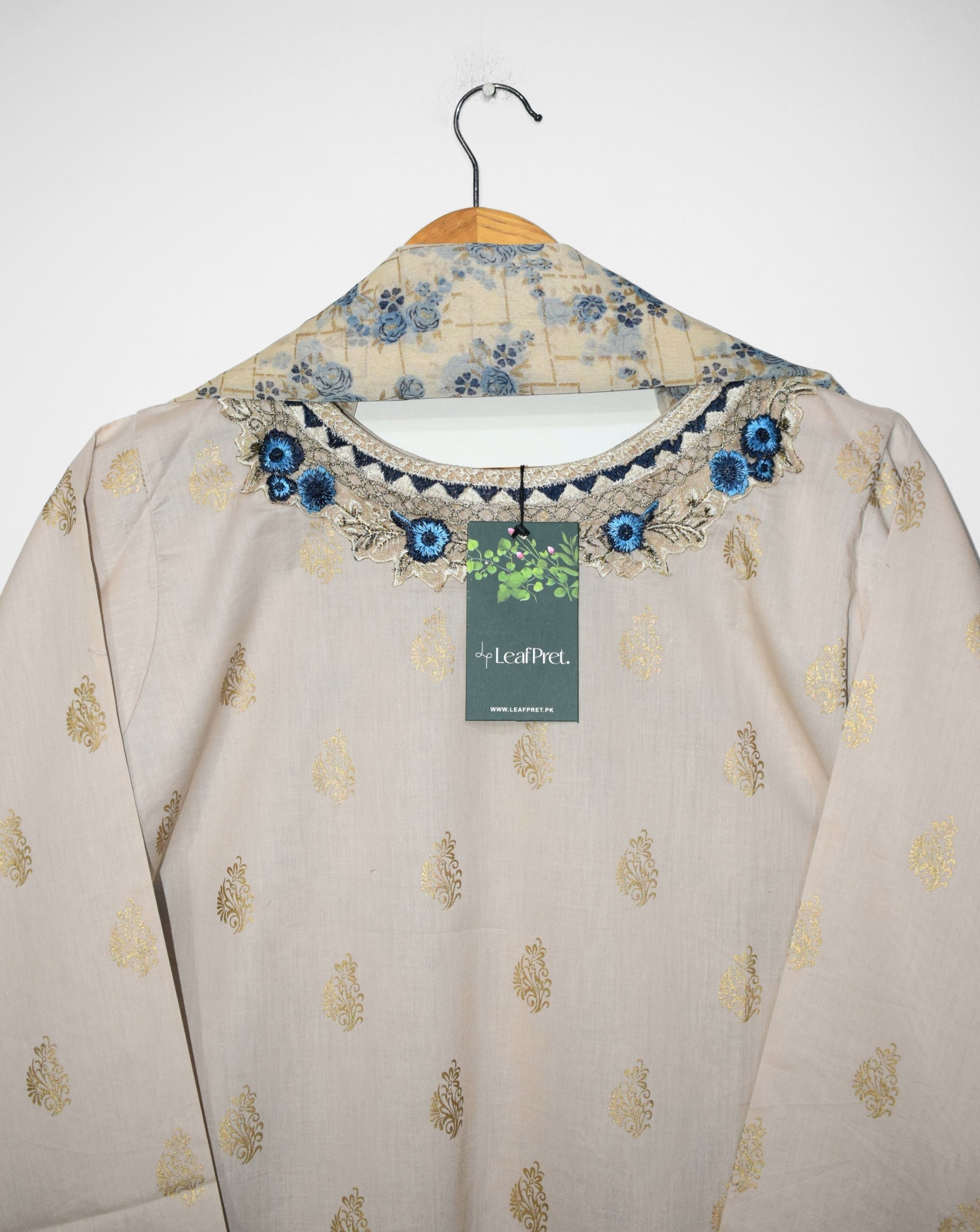 Beige Blue embroidered neckline detail with blue accents stitched lawn suit