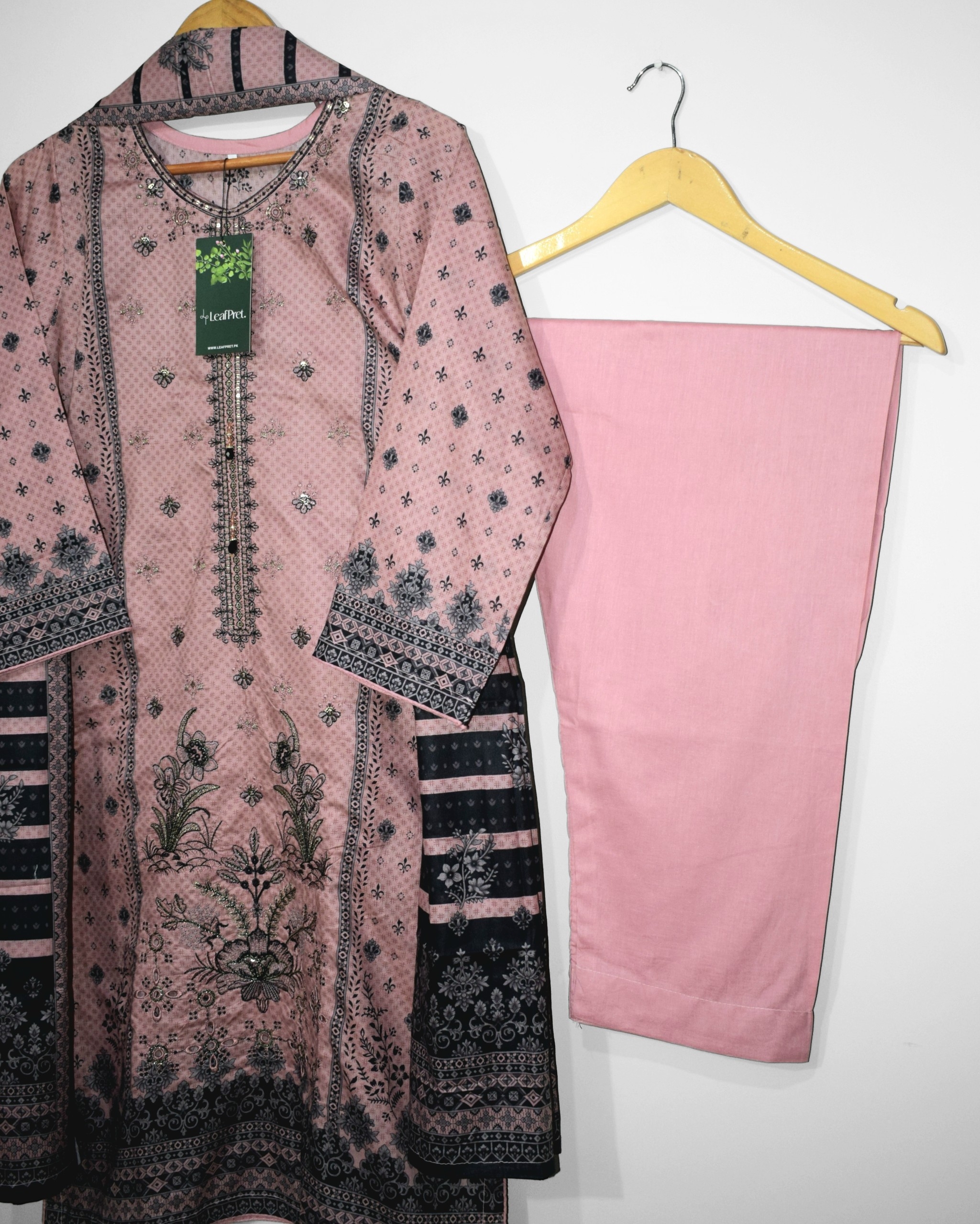 Plain blush pink lawn trouser for women paired with embroidered festive lawn shirt for Eid collection