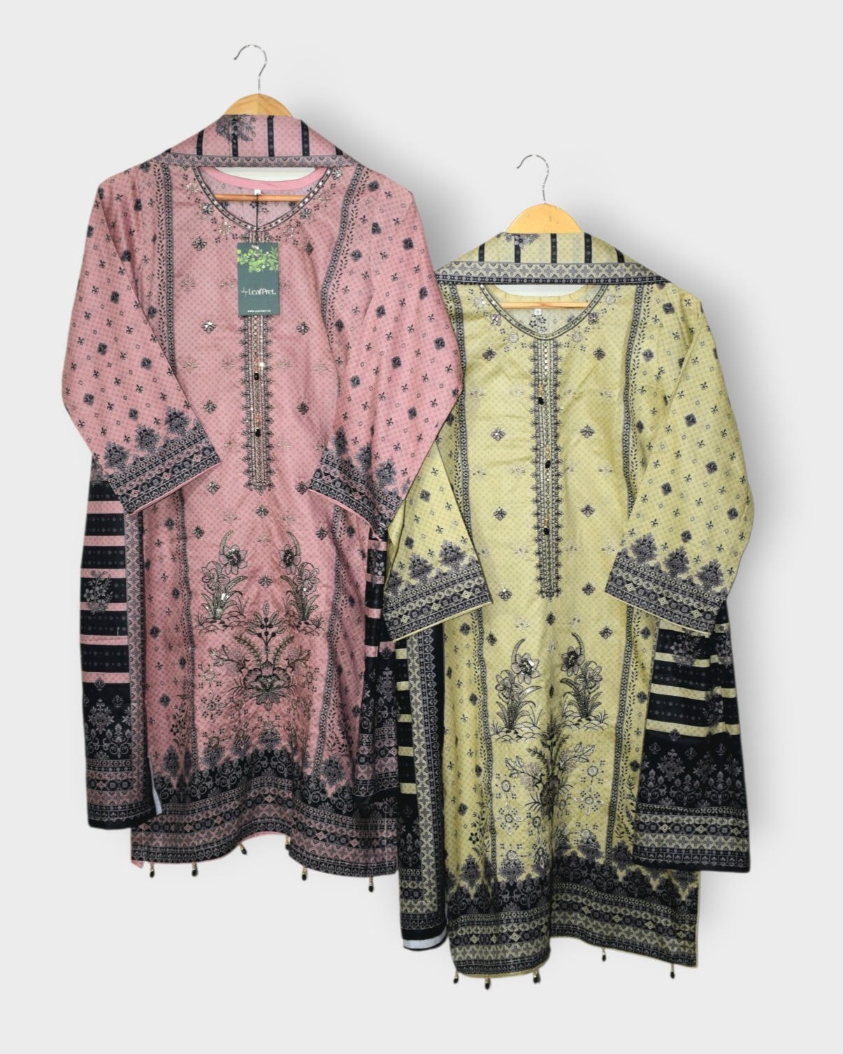 Rangrez 2.0 embroidered lawn stitched Eid collection featuring blush pink and pastel lemon Pakistani 3 piece suits with digital printed dupattas