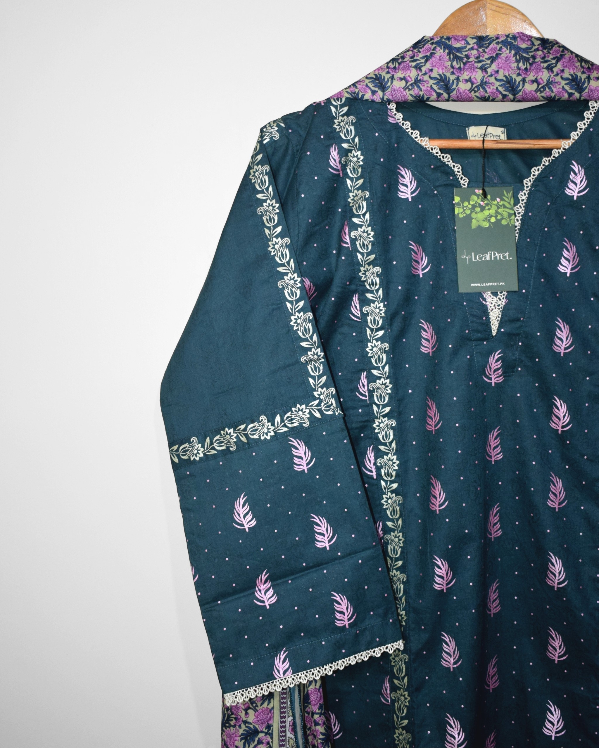 Mahveen teal lawn stitched suit neckline with lace detailing and floral screen print design