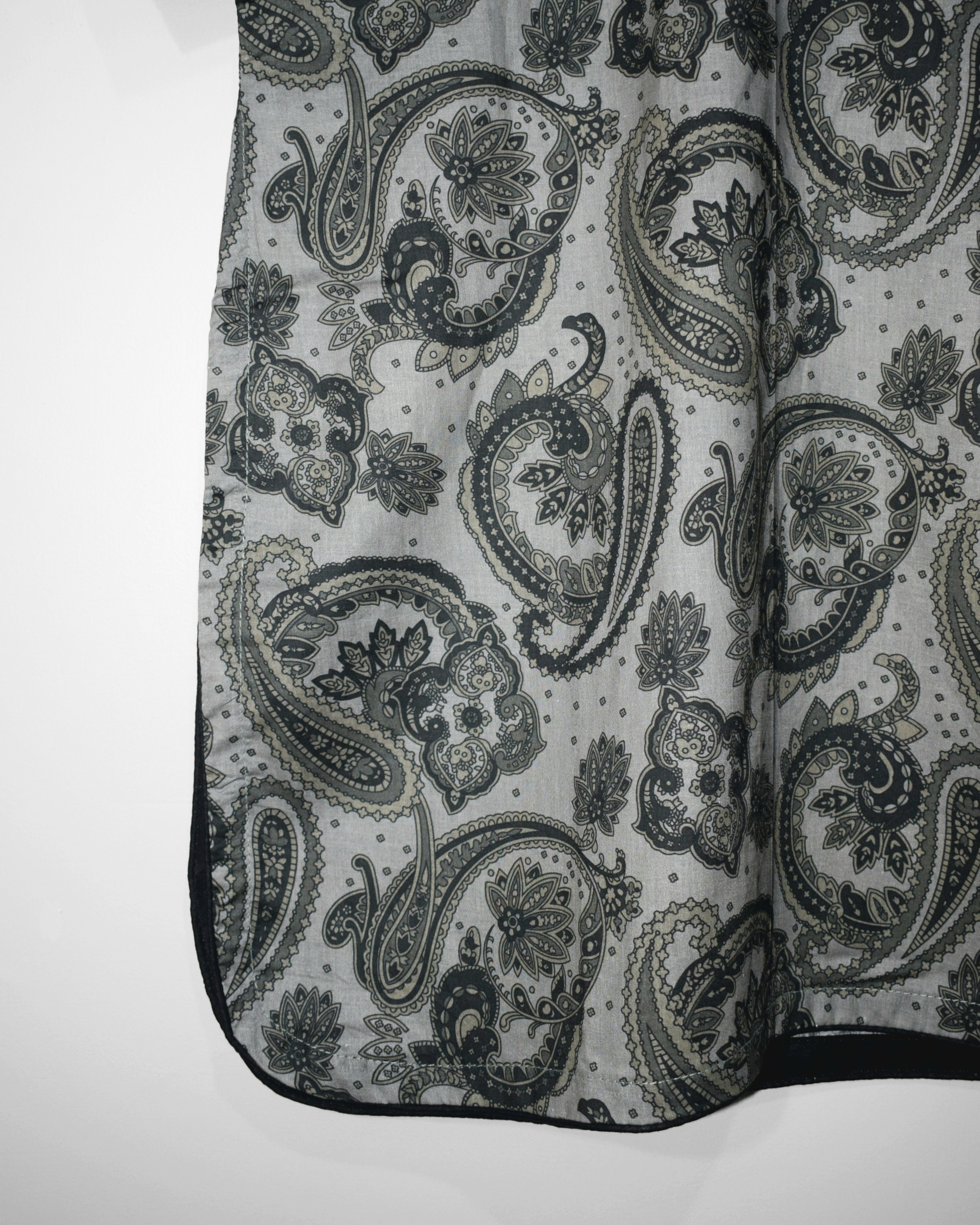 Round daman design with black piping on Noir Paisley stitched lawn summer shirt by LeafPret
