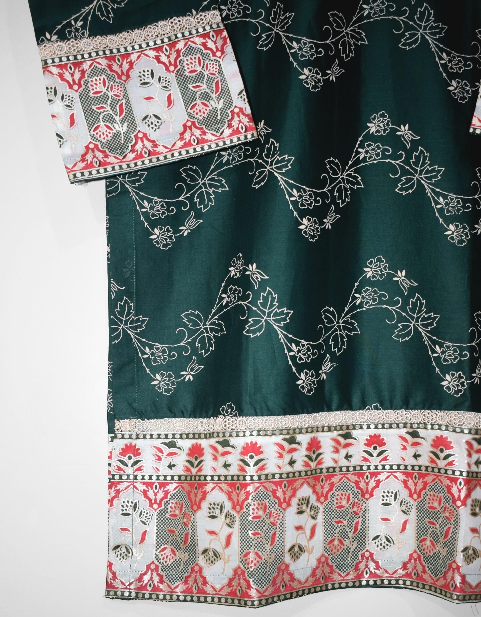 Detailed view of printed daman border on Emerald lawn suit shirt with elegant floral design and soft fabric flow